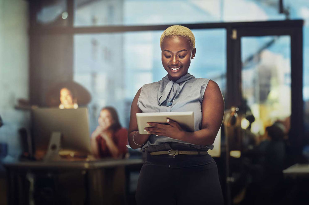 Professional woman holding tablet